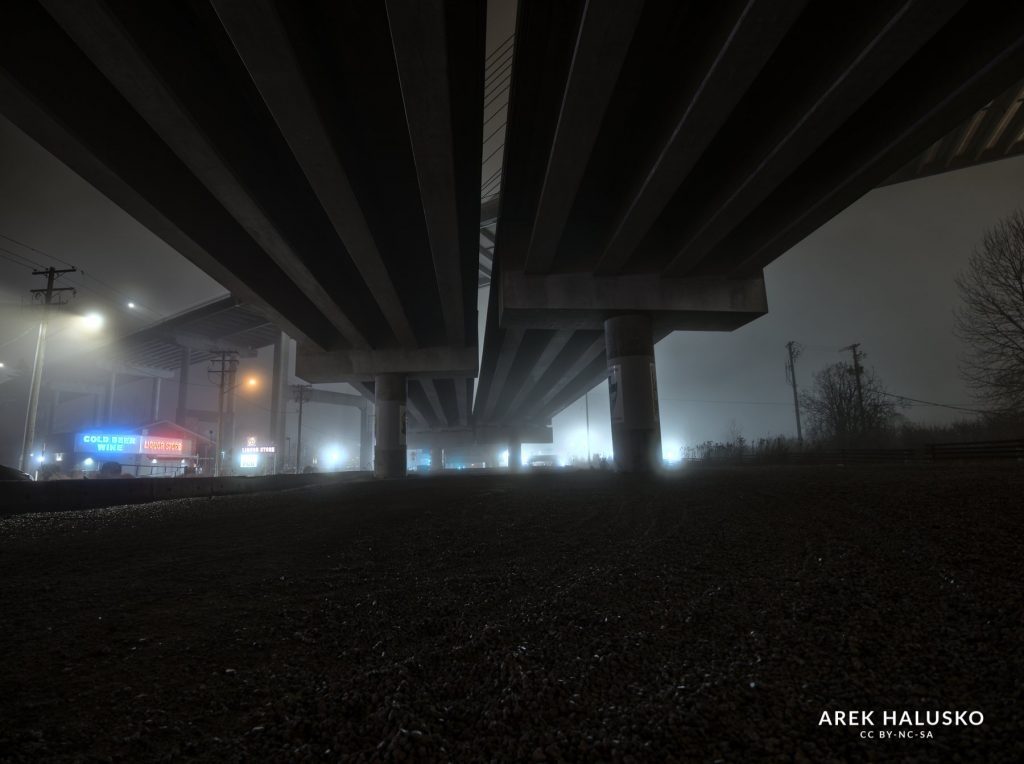 Under Alex Fraser Bridge on a foggy night.